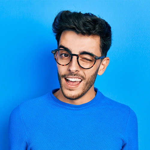 Man in blue background.